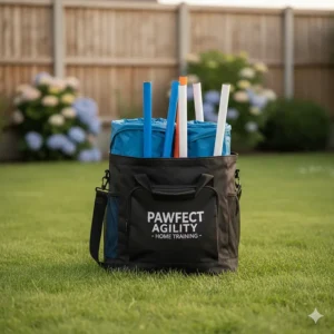 A portable dog agility kit packed neatly into a branded carry bag for easy storage.